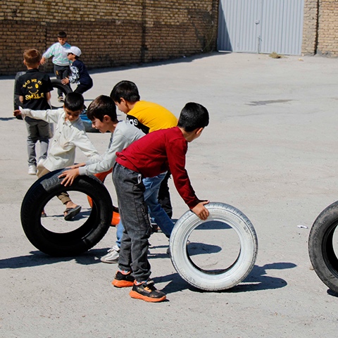Kids playing with tires