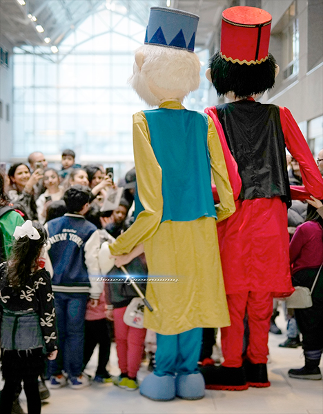 Large puppets and the crowd at the Willowdale Nowruz Festival